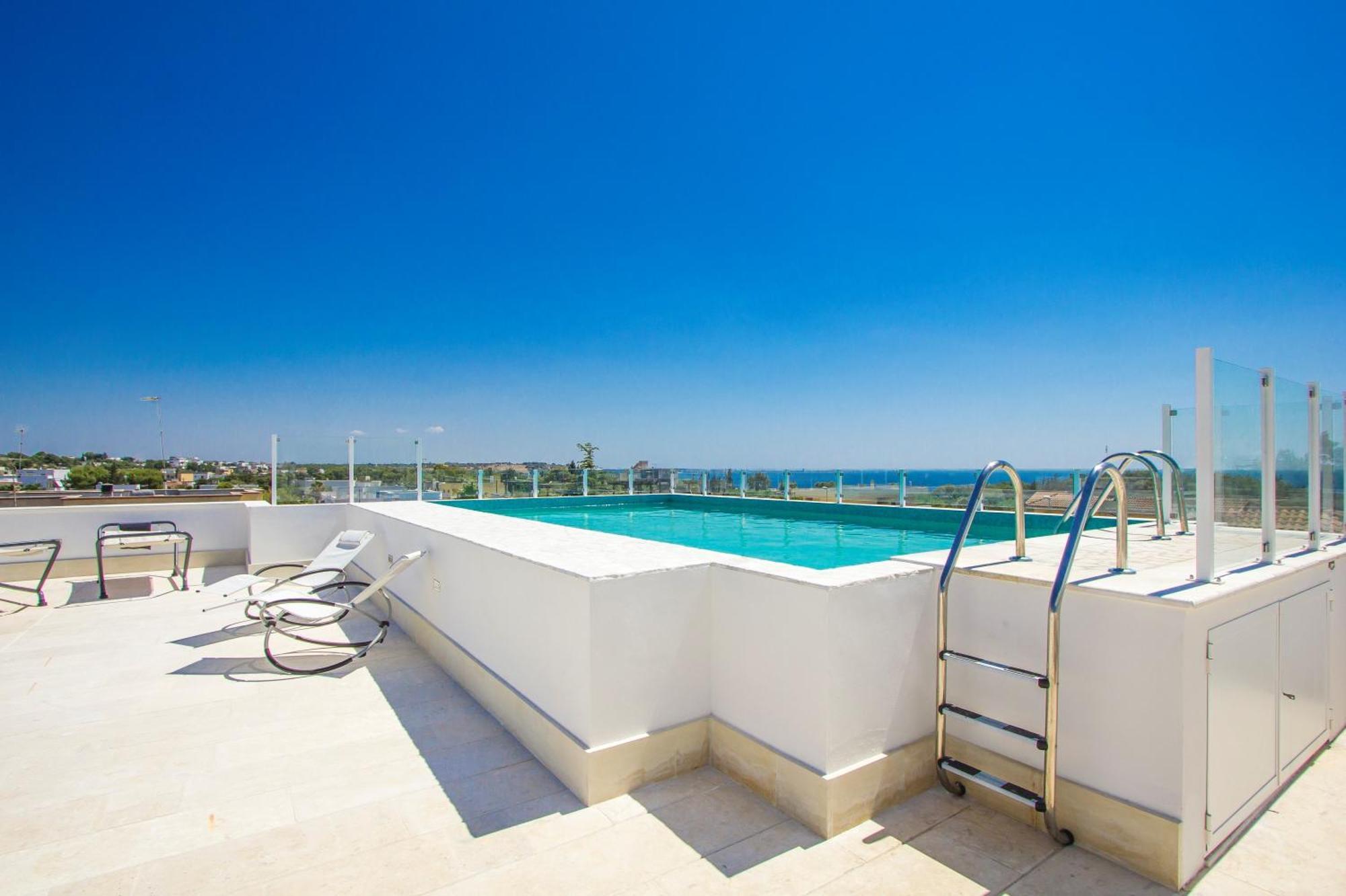 Aparthotel Residence Ludovica - Piscina Panoramica Vista Mare سانتا ماريا أل بانيو المظهر الخارجي الصورة
