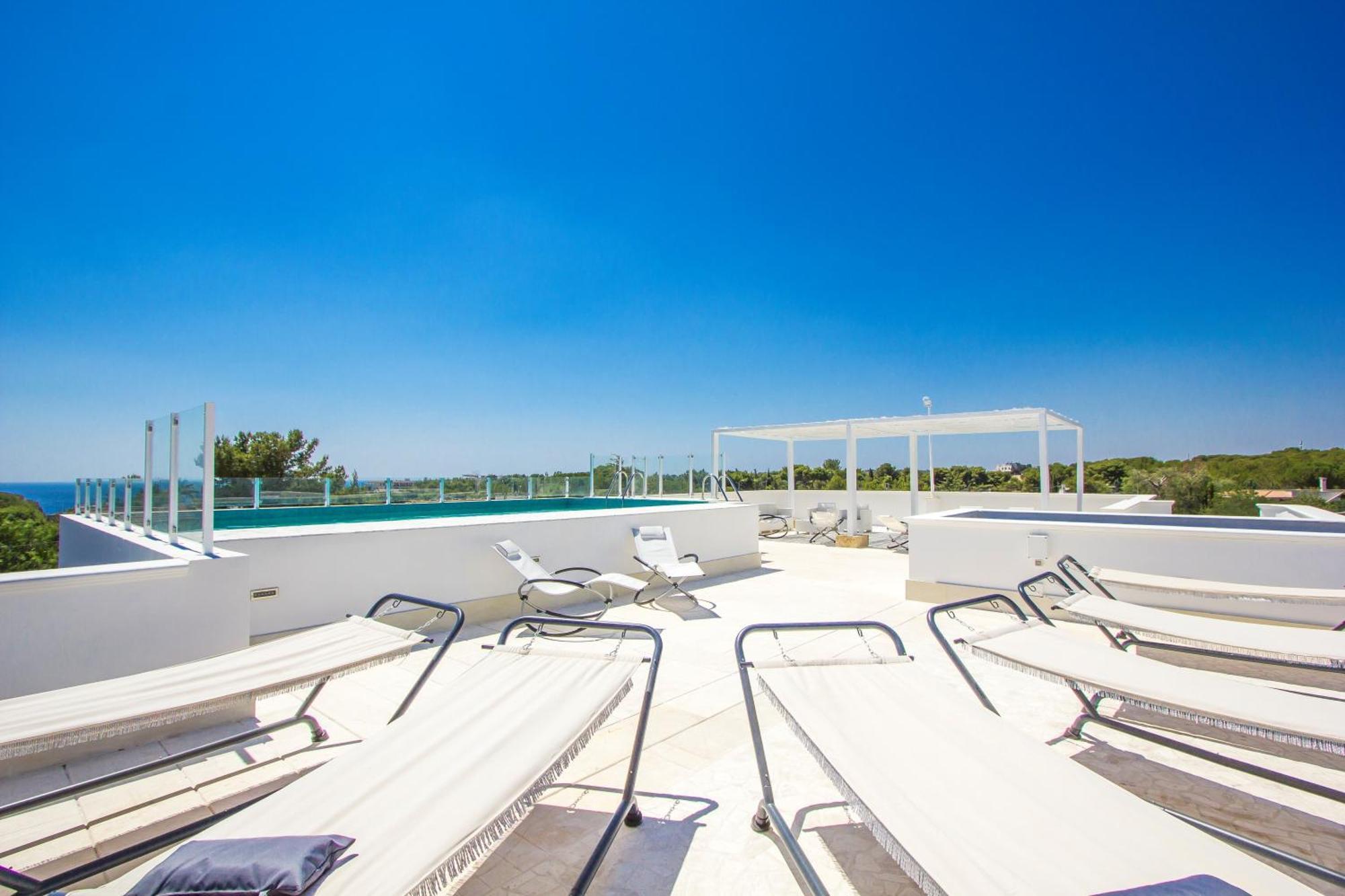 Aparthotel Residence Ludovica - Piscina Panoramica Vista Mare سانتا ماريا أل بانيو المظهر الخارجي الصورة
